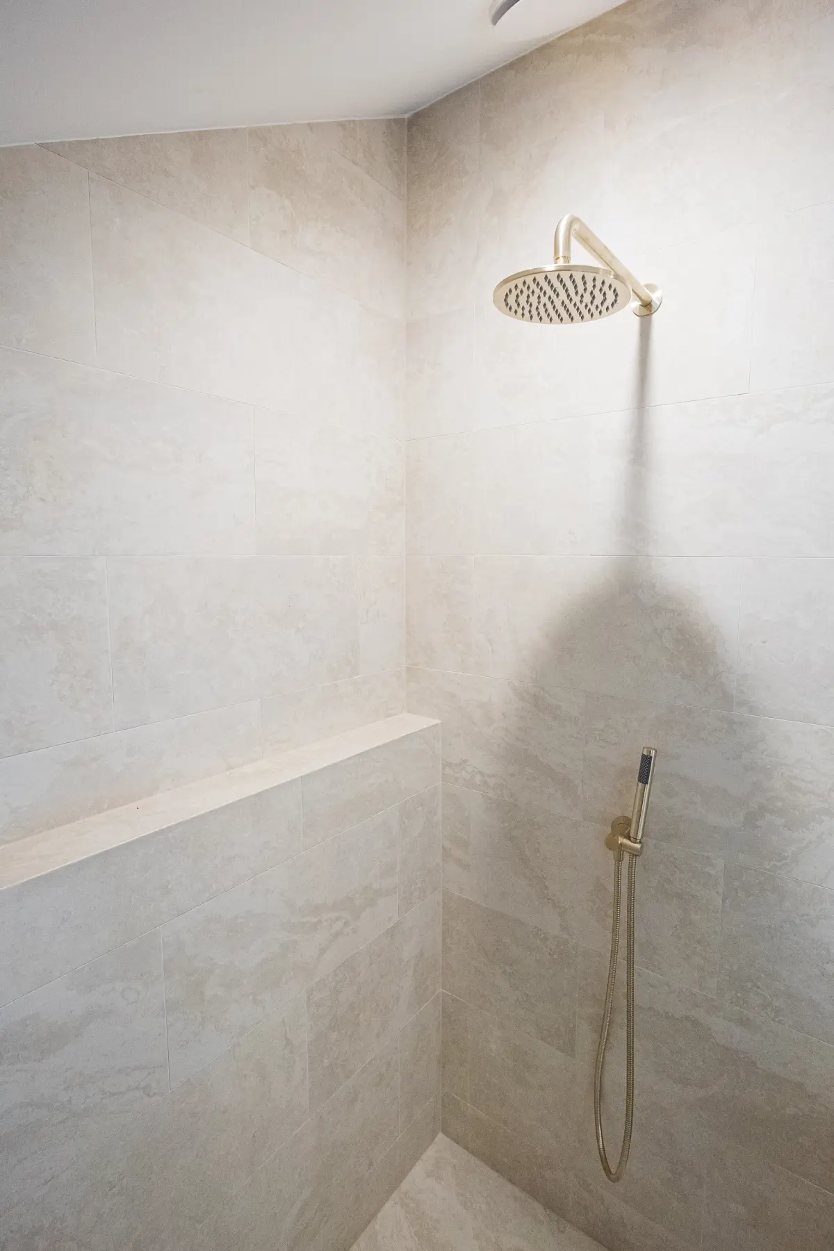 Modern freestanding tub with walk-in glass shower