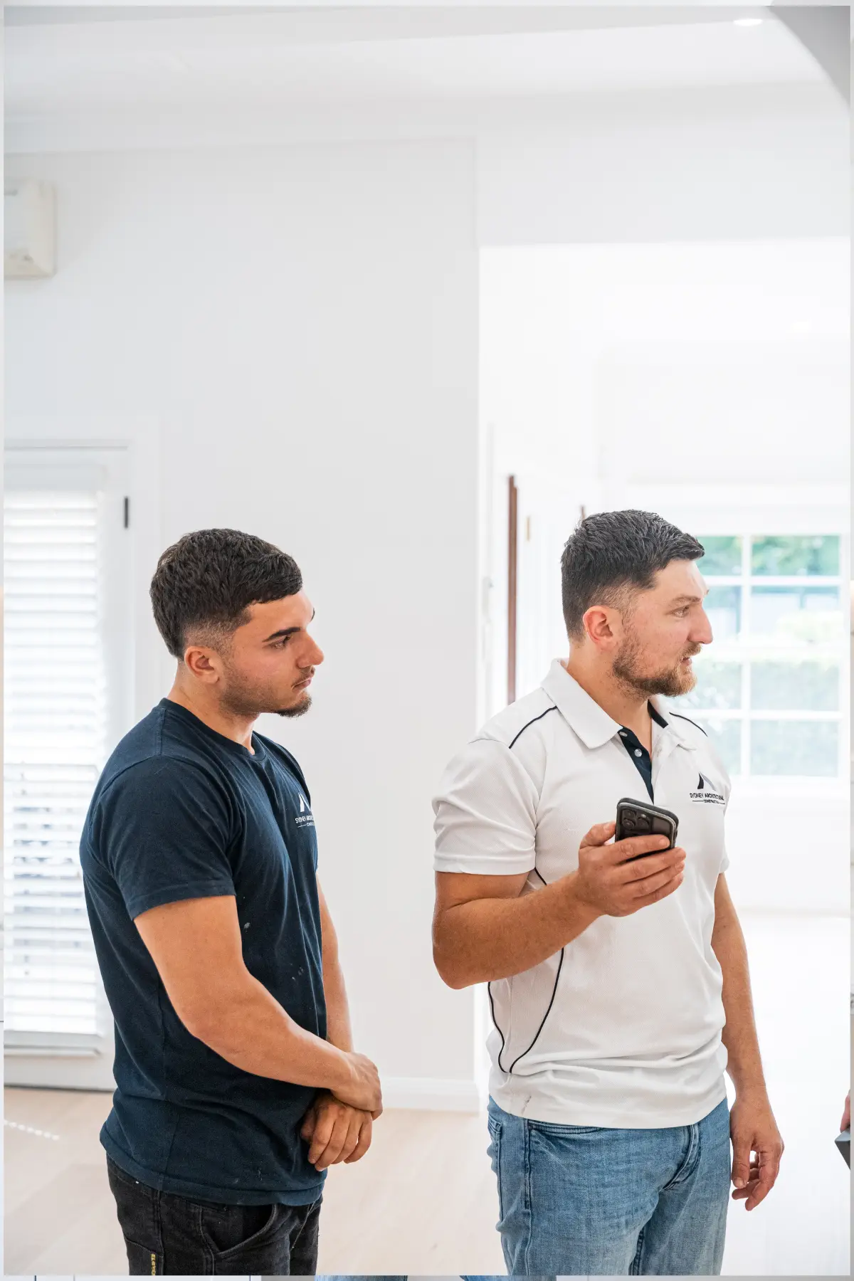 Person taking a site photo during construction