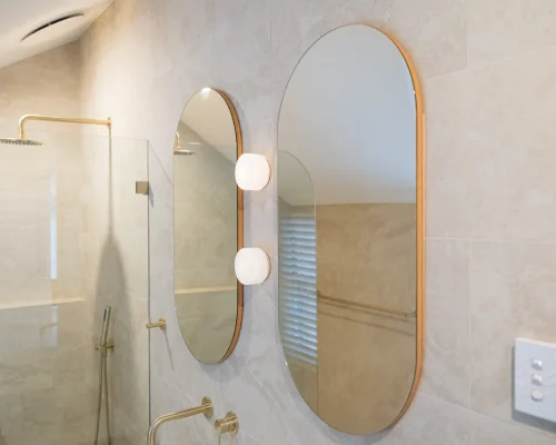 Minimalist white bathroom with black matte fixtures