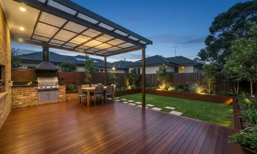 Beautiful alfresco area with timber deck, outdoor kitchen, and covered pergola in Sydney.