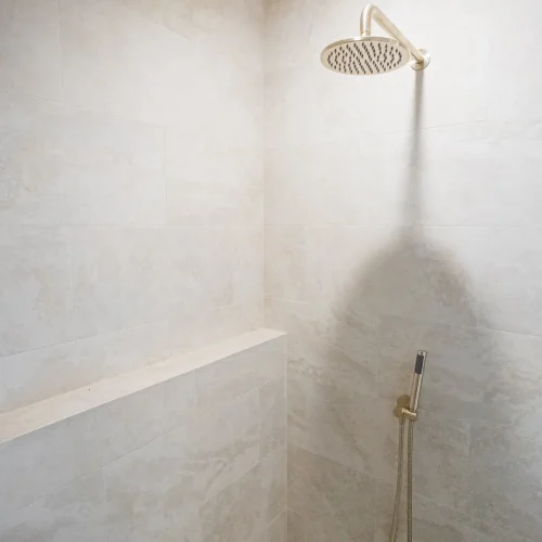 Modern freestanding tub with walk-in glass shower